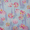 Tissu bleu pastel fleurs fuchsia orange et blanches en coton dobby