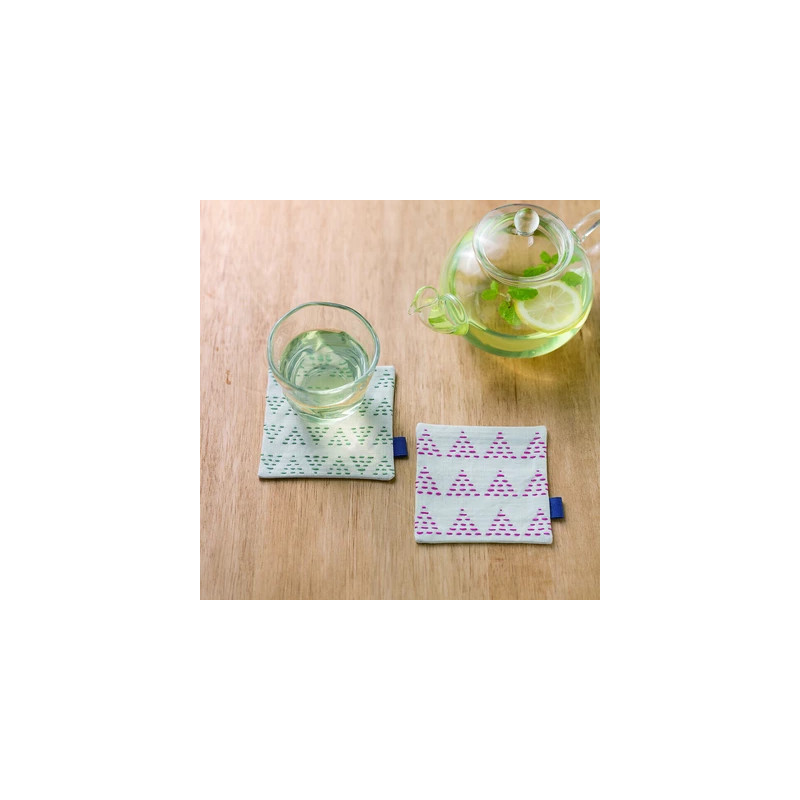 Sashiko kit 2 light beige coasters with fuchsia and green patterns