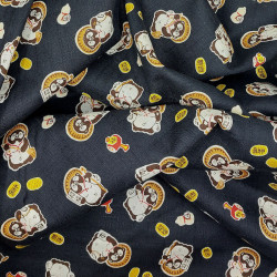 Tissu noir motifs de tanuki en coton dobby