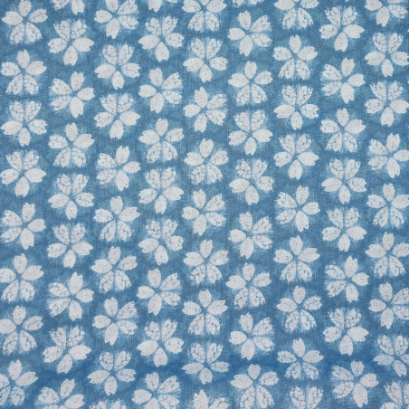 Light Japanese cotton fabric in light blue with cherry blossom patterns shibori spirit
