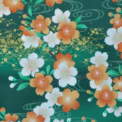 Green Japanese fabric with white, ornage and gold cherry blossom patterns
