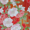 Red Japanese fabric with pink, white and gold cherry blossom patterns