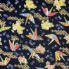 Japanese fabric with origami cranes and flowers on a black background
