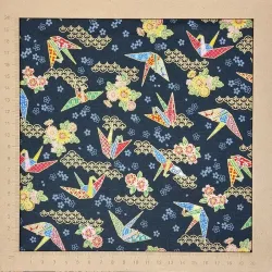 Japanese fabric with origami cranes and flowers on a black background