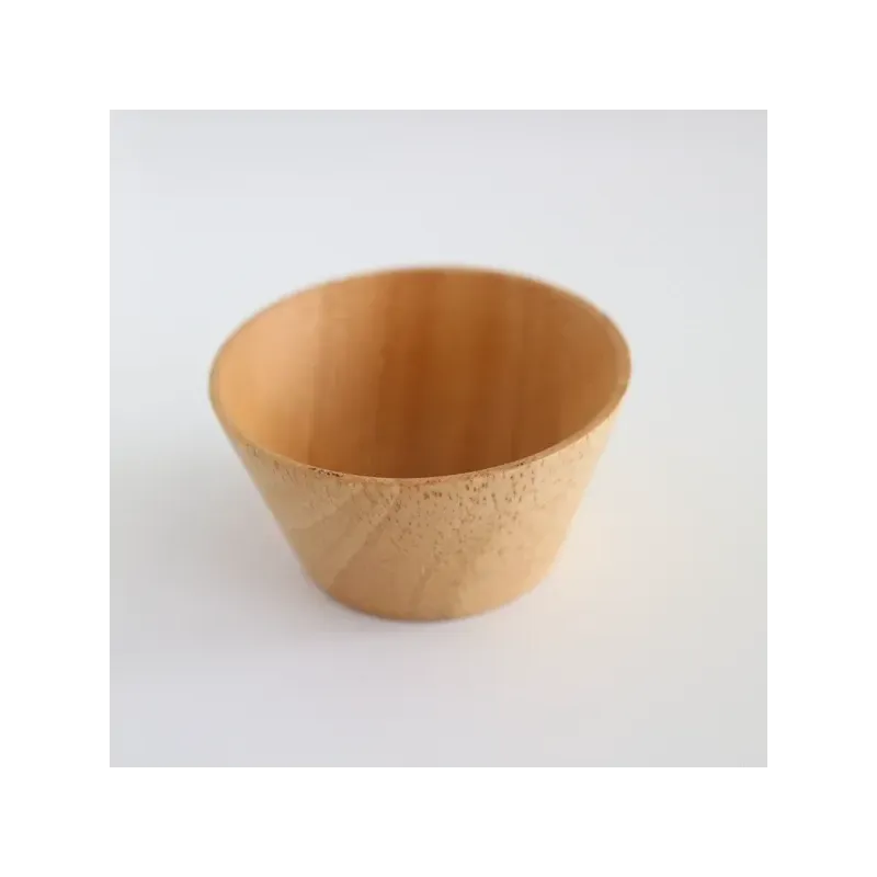 Petit bol en bois clair pour piques-aiguilles