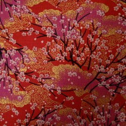 Red, pink and gold fabric with cherry blossom patterns