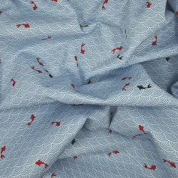 Light blue textured fabric with carps and waves patterns